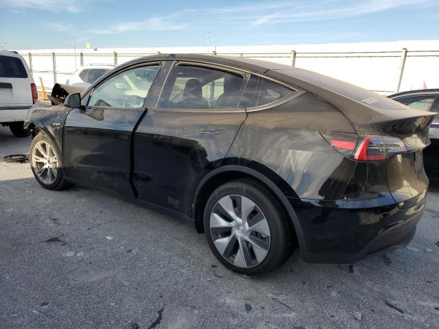 Photo 2 from auction – 2023 TESLA MODEL Y with VIN 7SAYGAEE7PF666053