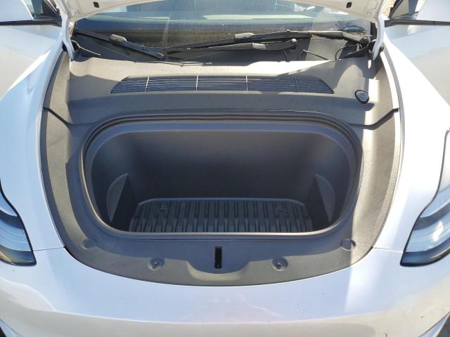 Photo 11 from auction – 2023 TESLA MODEL Y with VIN 7SAYGDEE4PA120471