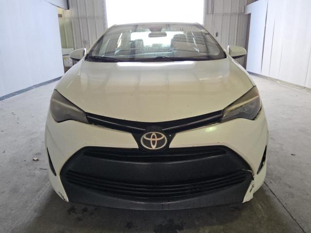 Photo 5 from auction – 2018 TOYOTA COROLLA L with VIN 5YFBURHE5JP793093