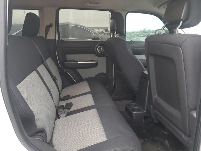 Photo 11 from auction – 2010 DODGE NITRO SXT with VIN 1D4PU5GK4AW138794