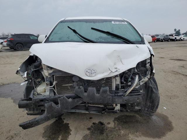 Photo 5 from auction – 2015 TOYOTA SIENNA LE with VIN 5TDKK3DC7FS690084