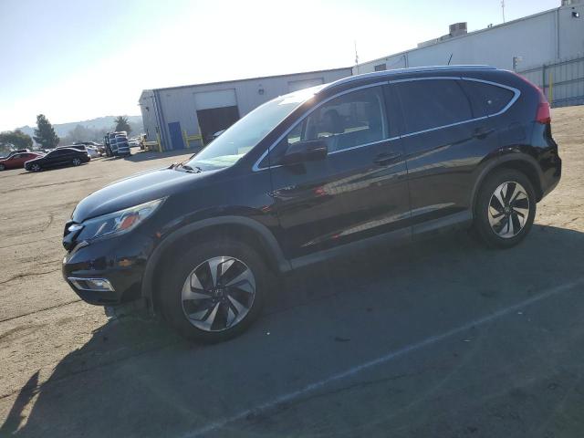 Photo 1 from auction – 2015 HONDA CR-V TOURI with VIN 5J6RM3H94FL018342