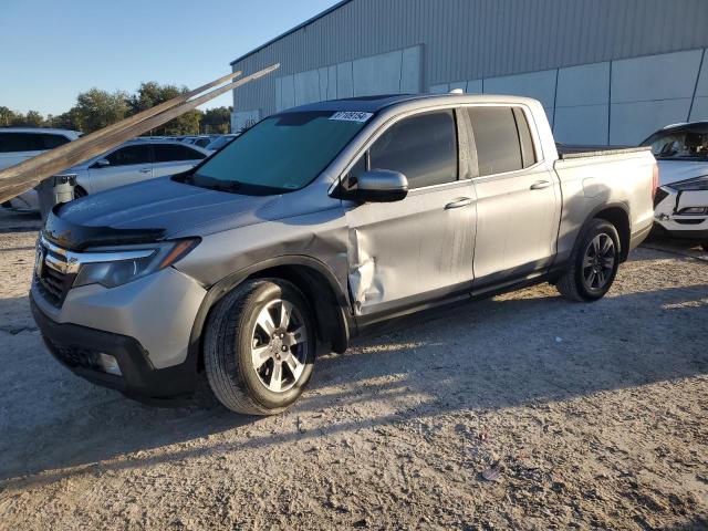 HONDA RIDGELINE 2019 with VIN 5FPYK2F63KB004799 - Photo from auction