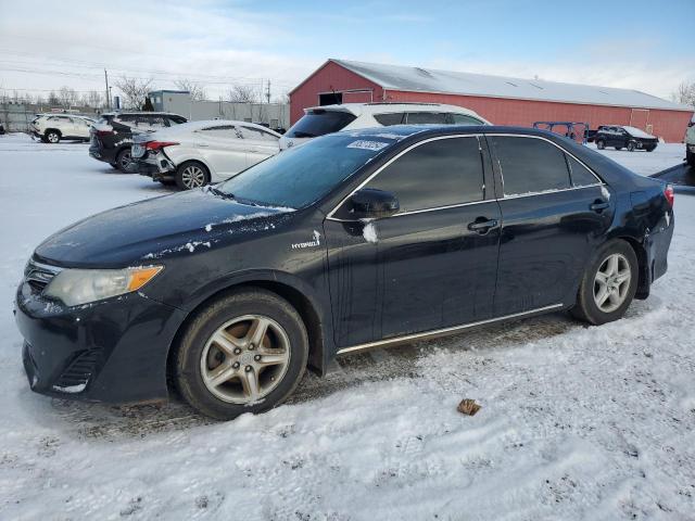 TOYOTA CAMRY HYBR 2014 with VIN 4T1BD1FK7EU118683 - Photo from auction