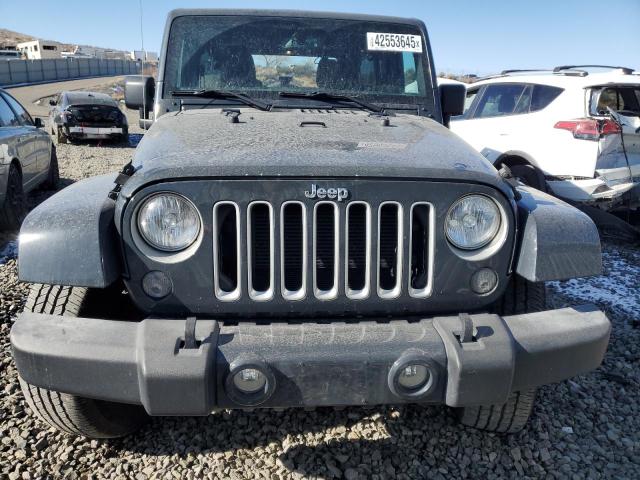 Photo 5 from auction – 2016 JEEP WRANGLER U with VIN 1C4BJWEG6GL176588