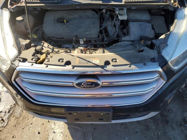 Photo 12 from auction – 2017 FORD ESCAPE SE with VIN 1FMCU9GD0HUC41412