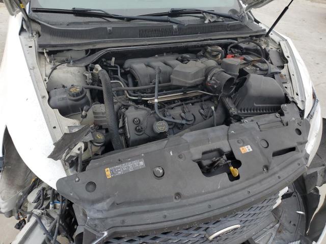 Photo 11 from auction – 2014 FORD TAURUS POL with VIN 1FAHP2L88EG154875