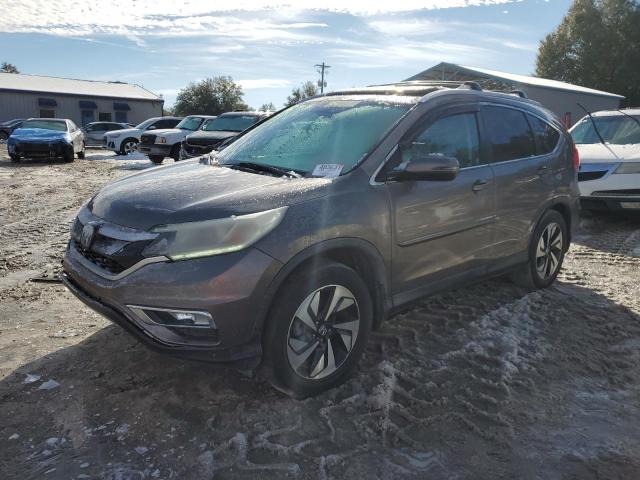 HONDA CR-V TOURI 2016 with VIN 5J6RM4H93GL108380 - Photo from auction