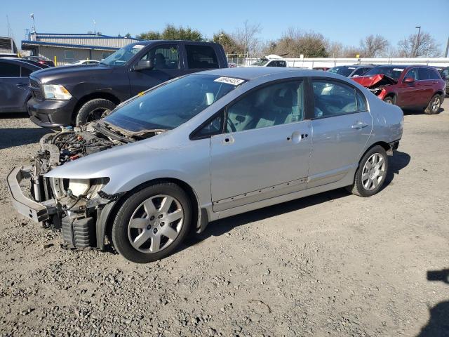 HONDA CIVIC LX 2009 with VIN 19XFA16589E040394 - Photo from auction