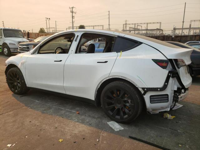 Снимка 2 от търг – 2023 TESLA MODEL Y с VIN 7SAYGAEE1PF620153