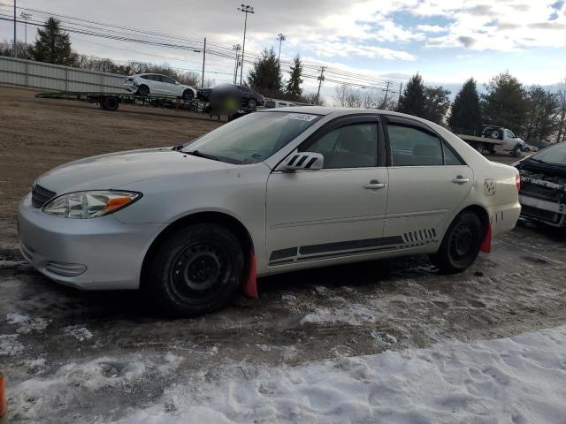 TOYOTA CAMRY LE 2002 with VIN JTDBE30K020056018 - Photo from auction