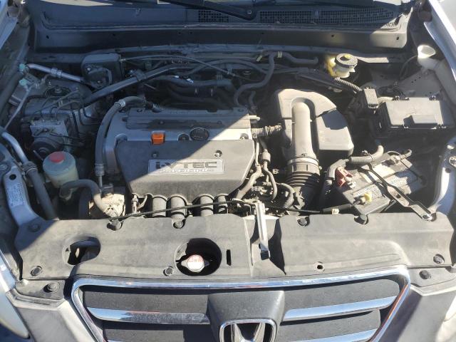 Photo 12 from auction – 2006 HONDA CR-V LX with VIN JHLRD68576C028953
