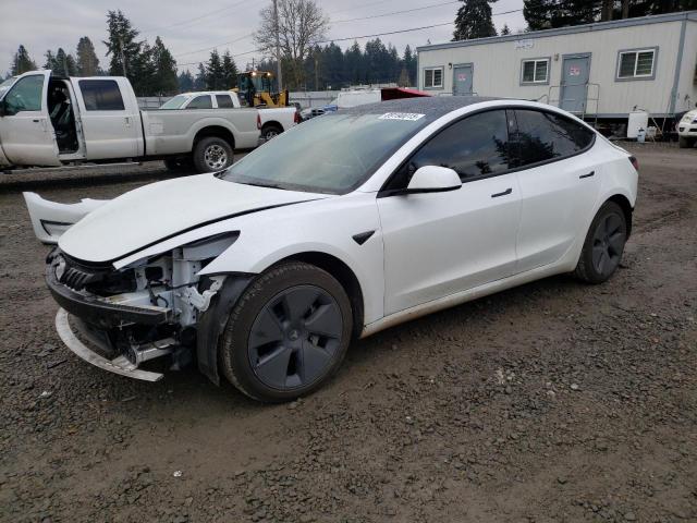 TESLA MODEL 3 2022 with VIN 5YJ3E1EB7NF334565 - Photo from auction