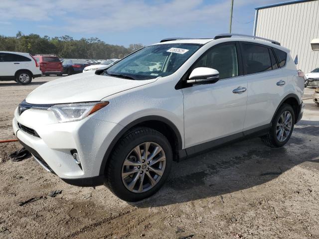 TOYOTA RAV4 LIMIT 2016 with VIN JTMYFREV6GJ073727 - Photo from auction