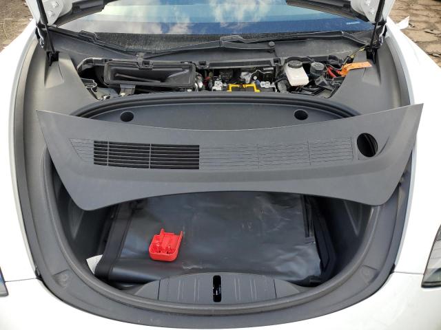 Photo 12 from auction – 2021 TESLA MODEL 3 with VIN 5YJ3E1EB3MF050946