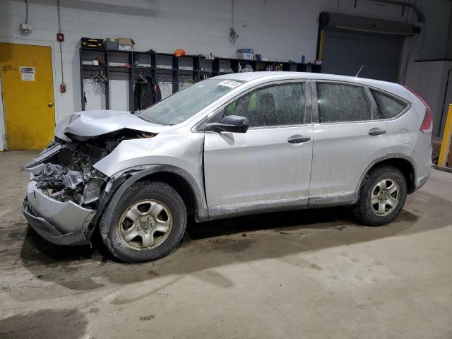 HONDA CR-V LX 2014 with VIN 2HKRM4H33EH670511 - Photo from auction