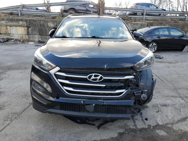 Photo 5 from auction – 2018 HYUNDAI TUCSON VAL with VIN KM8J3CA23JU667129