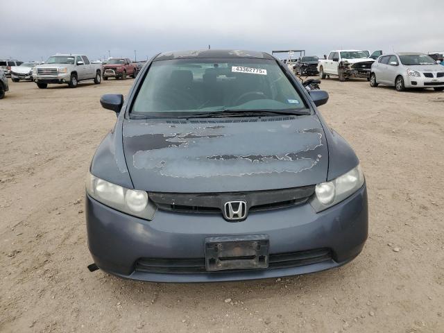 Photo 5 from auction – 2006 HONDA CIVIC HYBR with VIN JHMFA36296S019322