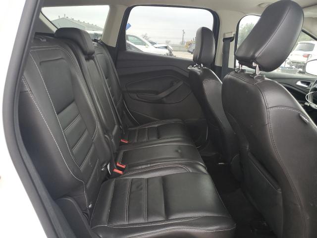 Photo 11 from auction – 2019 FORD ESCAPE TIT with VIN 1FMCU0J95KUB82848