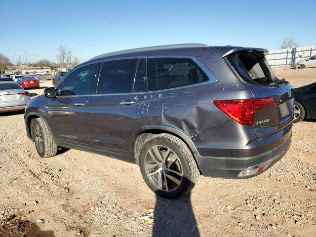 Photo 2 from auction – 2016 HONDA PILOT TOUR with VIN 5FNYF5H92GB048760