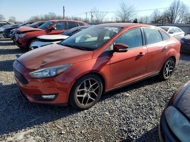 FORD FOCUS SE 2018 with VIN 1FADP3F28JL254696 - Photo from auction