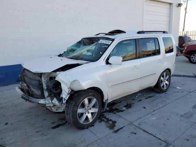 HONDA PILOT TOUR 2013 with VIN 5FNYF4H98DB056111 - Photo from auction