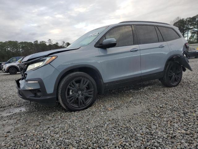 HONDA PILOT BLAC 2022 with VIN 5FNYF6H77NB029428 - Photo from auction