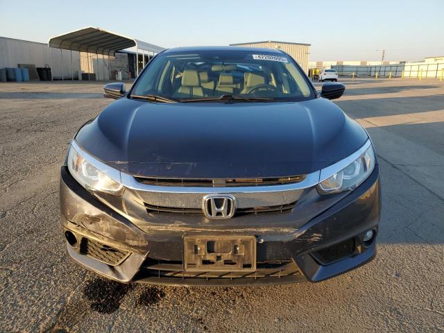 Photo 5 from auction – 2016 HONDA CIVIC EX with VIN 19XFC1F41GE208360