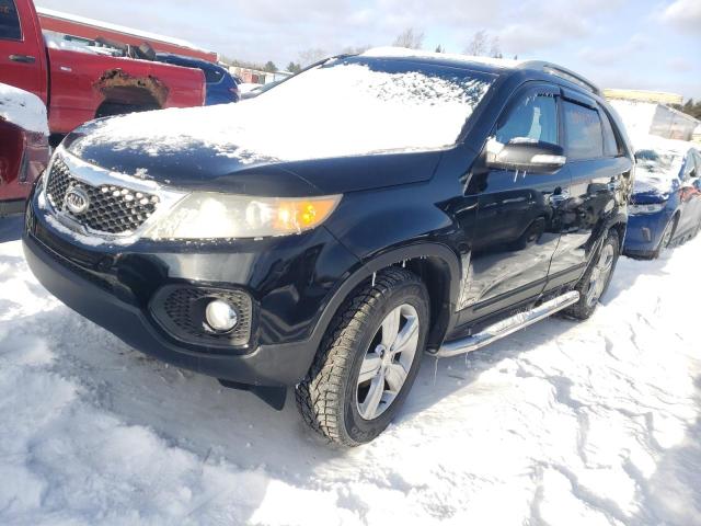 KIA SORENTO EX 2011 with VIN 5XYKUDA27BG181888 - Photo from auction