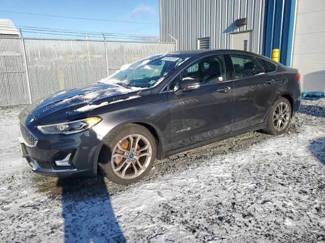 FORD FUSION TIT 2019 with VIN 3FA6P0RU9KR243889 - Photo from auction