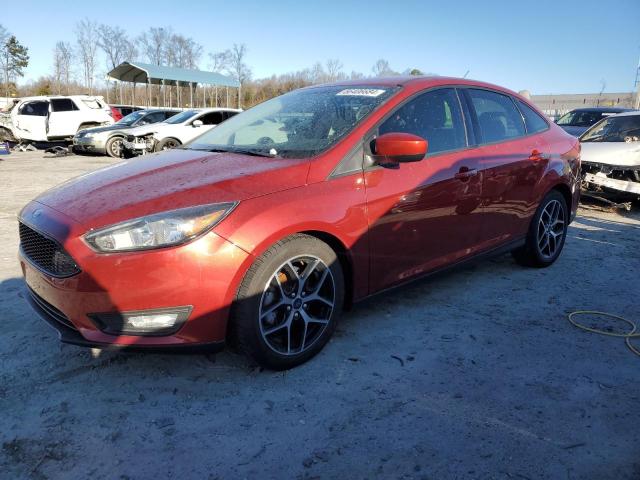 FORD FOCUS SE 2018 with VIN 1FADP3F21JL329528 - Photo from auction