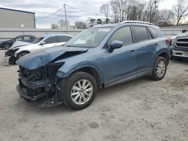 MAZDA CX-5 TOURI 2016 with VIN JM3KE2CY1G0885690 - Photo from auction