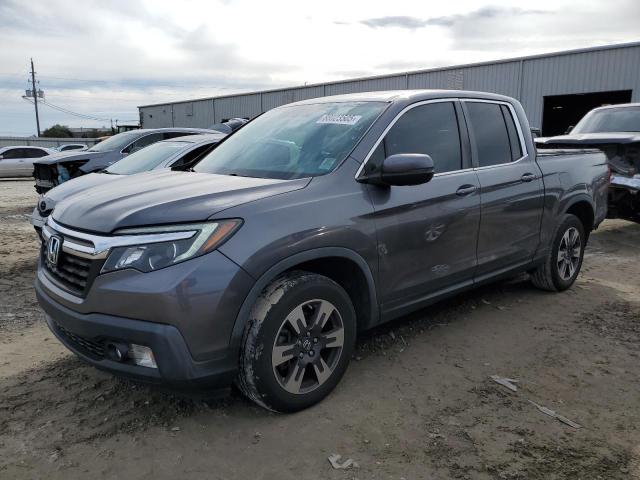 HONDA RIDGELINE 2017 with VIN 5FPYK2F6XHB007921 - Photo from auction