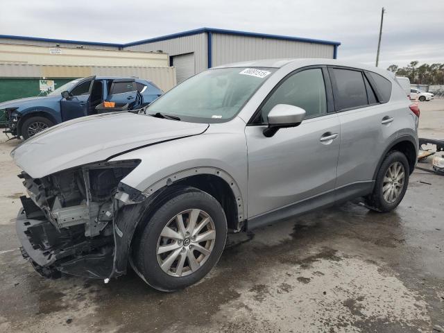 MAZDA CX-5 TOURI 2014 with VIN JM3KE2CYXE0372404 - Photo from auction