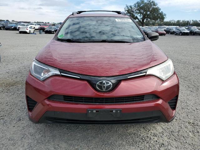 Photo 5 from auction – 2018 TOYOTA RAV4 LE with VIN JTMBFREV0JD234553