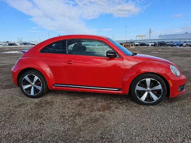 Photo 4 from auction – 2012 VOLKSWAGEN BEETLE TUR with VIN 3VW4A7AT2CM626650