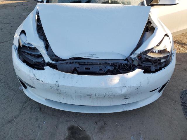Photo 11 from auction – 2022 TESLA MODEL 3 with VIN 5YJ3E1EA0NF250949