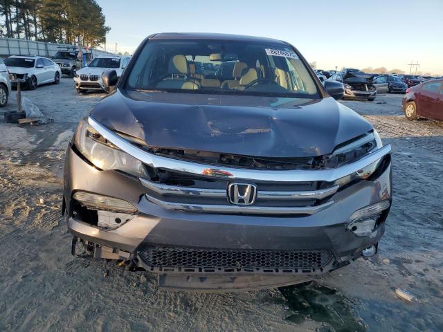 Photo 5 from auction – 2018 HONDA PILOT EXL with VIN 5FNYF5H58JB027982