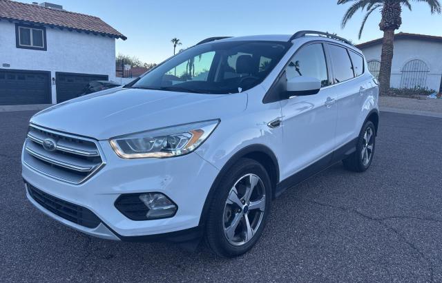 Photo 2 from auction – 2017 FORD ESCAPE SE with VIN 1FMCU0G99HUA92151