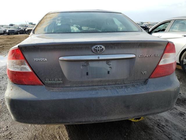 Photo 6 from auction – 2002 TOYOTA CAMRY LE with VIN JTDBF30K020035652