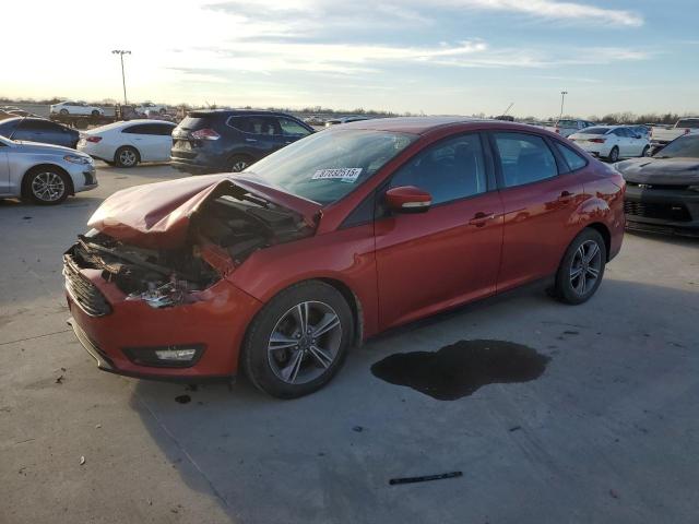 FORD FOCUS SE 2018 with VIN 1FADP3F29JL312377 - Photo from auction