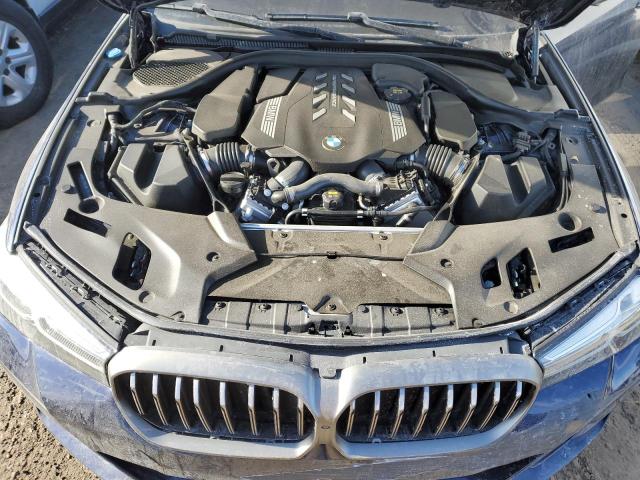 Photo 11 from auction – 2021 BMW M550XI with VIN WBA13BK03MCF21643