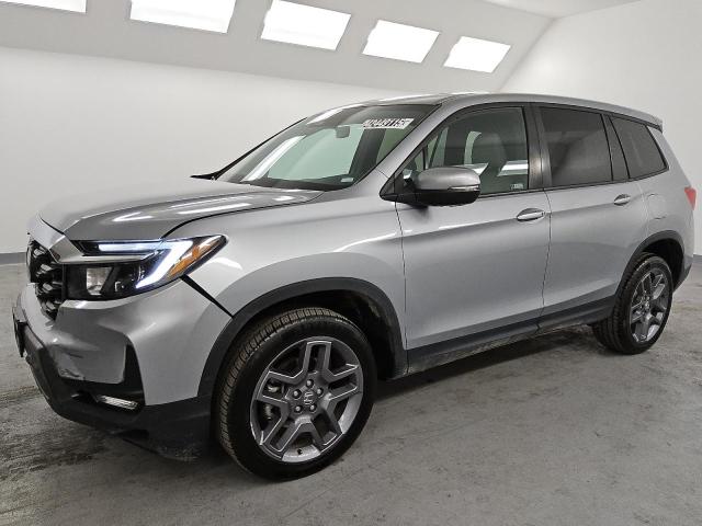 HONDA PASSPORT E 2023 with VIN 5FNYF8H57PB012769 - Photo from auction