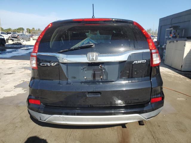 Photo 6 from auction – 2015 HONDA CR-V EX with VIN 2HKRM4H56FH624061