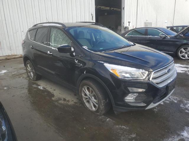 Photo 4 from auction – 2018 FORD ESCAPE SE with VIN 1FMCU9GD0JUB93271