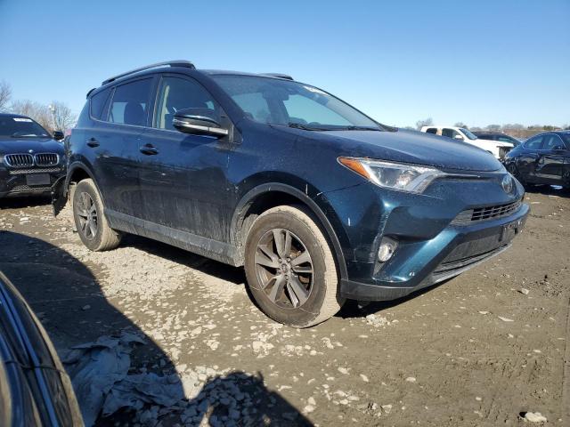 Photo 4 from auction – 2017 TOYOTA RAV4 XLE with VIN JTMRFREV8HJ108225