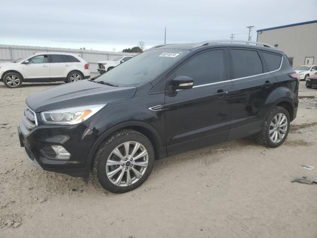 FORD ESCAPE TIT 2017 with VIN 1FMCU9JD4HUC61123 - Photo from auction