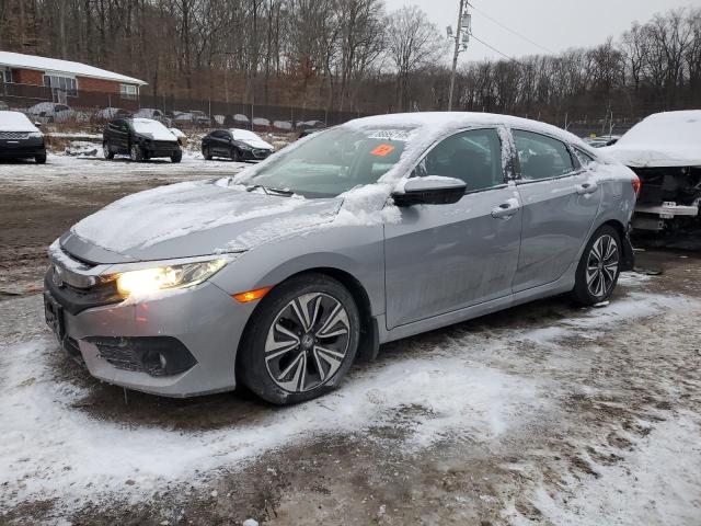 HONDA CIVIC EXL 2016 with VIN 2HGFC1F7XGH647413 - Photo from auction