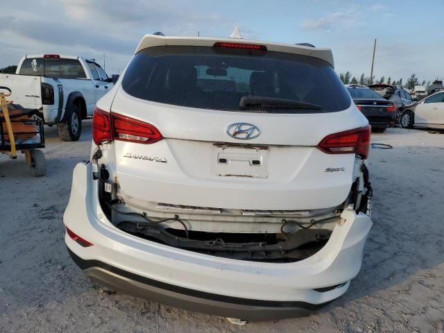 Photo 6 from auction – 2017 HYUNDAI SANTA FE S with VIN 5NMZU3LB5HH022548