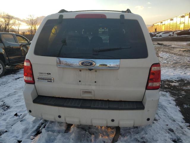 Photo 6 from auction – 2011 FORD ESCAPE LIM with VIN 1FMCU9E75BKA18542